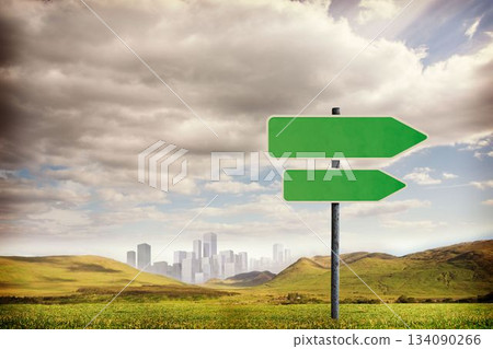 Green sign with city on horizon 134090266