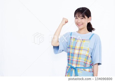 A housewife doing a fist pump 134090800