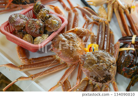 Pile of Large, Fresh Snow Crabs for Sale at Yeongdeok Fish Market, Korea Pile of Large, Fresh Snow Crabs for Sale at Yeongdeok Fish Market, Korea 134090810