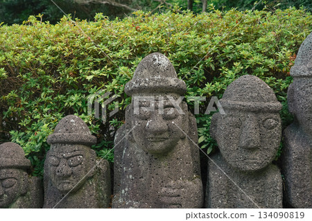 Stone Harvang Stone Statue Standing Side by Side, Symbol of Korea Jeju Island Stone Harvang Stone Statue Standing Side by Side, Symbol of Korea Jeju Island 134090819