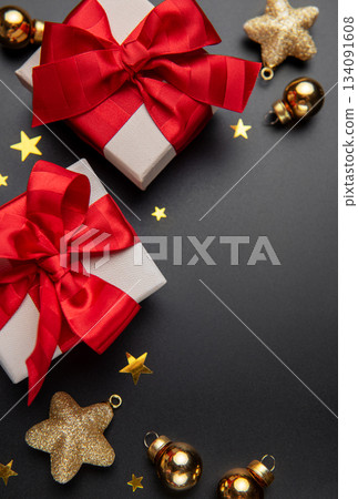Christmas gifts decorating a dark background with stars Christmas gifts decorating a dark background with stars 134091608