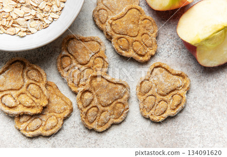 Homemade healthy dog treats with paw print shape 134091620