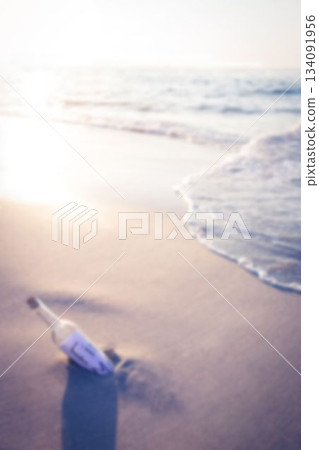Message in a bottle at sunny sea shore 134091956