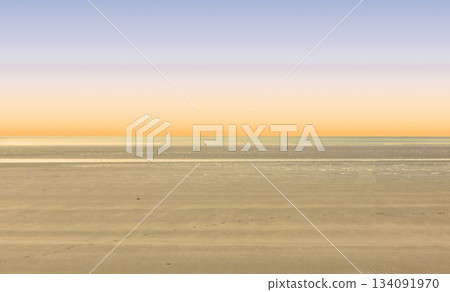 Flat design is showing expansive sandy shore extending toward calm sea under pastel gradient sky Flat design is showing expansive sandy shore extending toward calm sea under pastel gradient sky 134091970