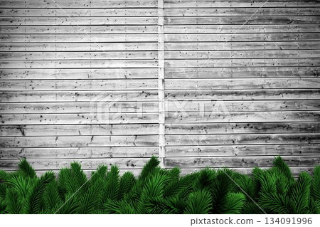 Fir branches on wooden planks Fir branches on wooden planks 134091996