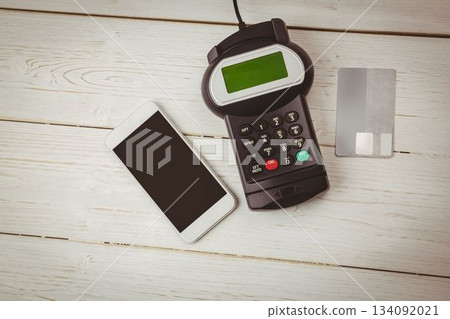 Scene is showing smartphone, payment terminal and credit card on white-painted table in flat design 134092021
