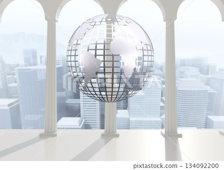 Silver globe floating in room 134092200