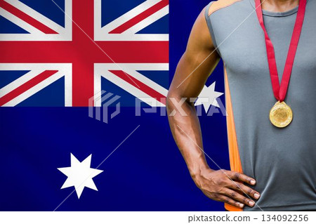 Midsection of medalist against Australian Flag Midsection of medalist against Australian Flag 134092256