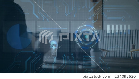 Presenting professional wearing shirt pointing at digital charts over laptop in office, copy space Presenting professional wearing shirt pointing at digital charts over laptop in office, copy space 134092620