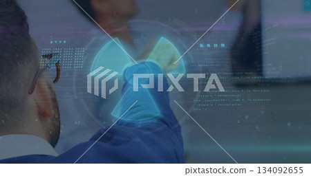 Pointing suited man showing 3D radiation symbol and code on glass panel in boardroom, copy space 134092655