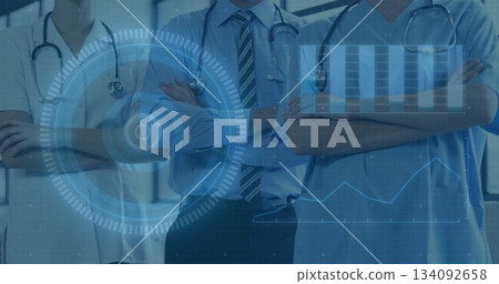 In hospital, doctors with crossed arms standing, medical data image overlaying 134092658