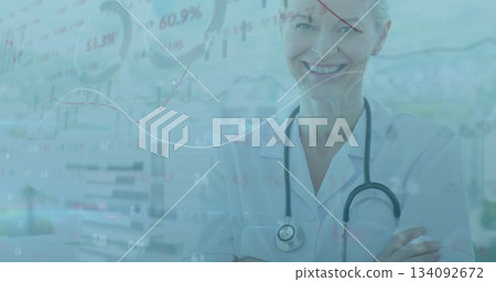 Standing white lab coat doctor analyzing digital financial graphs in clinic office, copy space Standing white lab coat doctor analyzing digital financial graphs in clinic office, copy space 134092672