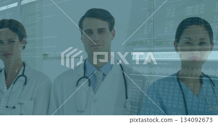 Doctors with encryption and data processing image overlay in hospital setting Doctors with encryption and data processing image overlay in hospital setting 134092673
