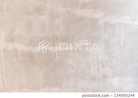 Prime oil based primer on old concrete wall before applying the main color.  renovation concept. 134093244