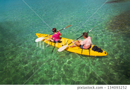 Asian senior couple on kayak in adventure travel in south east asia. 134093252