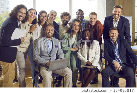 Group portrait of a happy smiling diverse business people at work in office. 134093817