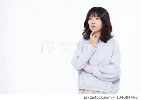 A woman who is seriously worried A woman who is seriously worried 134094450