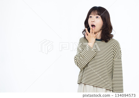 Surprised and amazed woman Surprised and amazed woman 134094573
