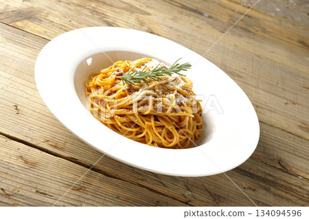 Spaghetti meat sauce with powdered cheese and rosemary Spaghetti meat sauce with powdered cheese and rosemary 134094596