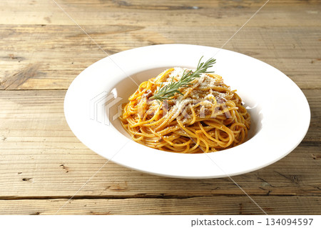 Spaghetti meat sauce with powdered cheese and rosemary Spaghetti meat sauce with powdered cheese and rosemary 134094597