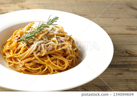 Spaghetti meat sauce with powdered cheese and rosemary Spaghetti meat sauce with powdered cheese and rosemary 134094604