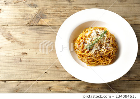Spaghetti meat sauce with powdered cheese and rosemary Spaghetti meat sauce with powdered cheese and rosemary 134094613