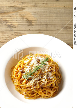 Spaghetti meat sauce with powdered cheese and rosemary Spaghetti meat sauce with powdered cheese and rosemary 134094619