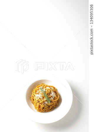 Spaghetti meat sauce with grated cheese and rosemary photographed on a white background 134095306