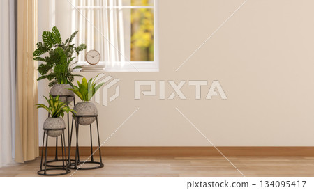 Green leaf plants in pot over metal stand holder on wooden parquet floor aside white wall and window Green leaf plants in pot over metal stand holder on wooden parquet floor aside white wall and window 134095417