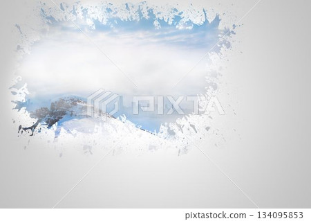 Splash on wall revealing snowy peak 134095853