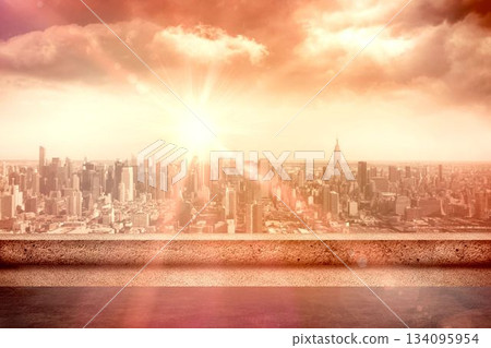 City skyline is glowing under rising sun on concrete terrace ledge, with lens flare flat design City skyline is glowing under rising sun on concrete terrace ledge, with lens flare flat design 134095954