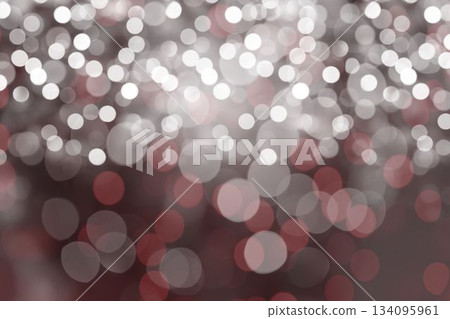 Flat design bokeh light pattern is spreading soft white and muted red circles over blurred backdrop 134095961