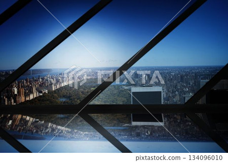Room with large window looking on city Room with large window looking on city 134096010