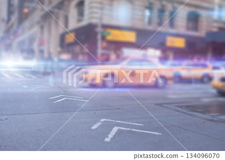 Single yellow taxi cab is racing past white road arrows by dark awnings in flat design 134096070