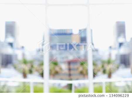 Flat design is showing bright overexposed urban skyline through white window frame with palm trees 134096229
