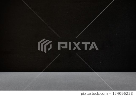 flat design studio scene is featuring smooth grey platform meeting textured black backdrop 134096238