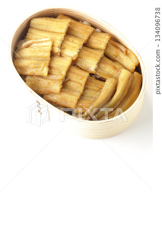 A bento box of boiled conger eel in a bento box photographed against a white background A bento box of boiled conger eel in a bento box photographed against a white background 134096738