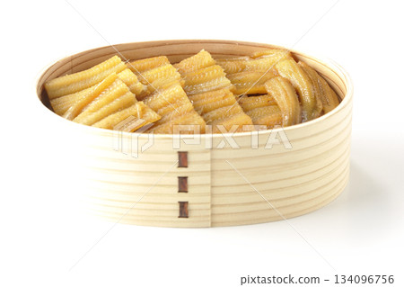 A bento box of boiled conger eel in a bento box photographed against a white background A bento box of boiled conger eel in a bento box photographed against a white background 134096756