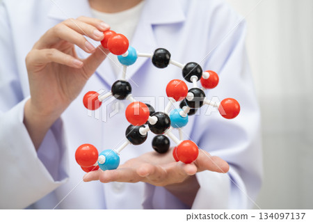 Molecules chemical on a periodic table background. Molecules chemical on a periodic table background. 134097137