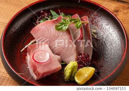Sashimi topped with yellowtail sashimi Sashimi topped with yellowtail sashimi 134097151