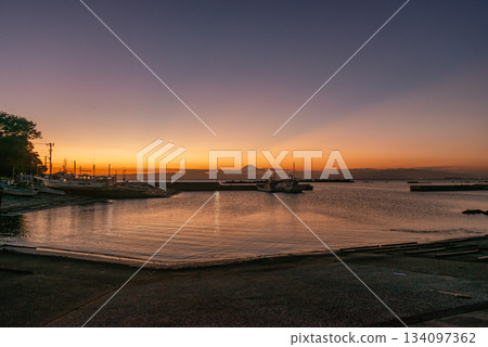 Boats at a fishing port on the Miura Peninsula at dusk with Mount Fuji in the distance (Yokosuka, Kanagawa Prefecture) Boats at a fishing port on the Miura Peninsula at dusk with Mount Fuji in the distance (Yokosuka, Kanagawa Prefecture) 134097362