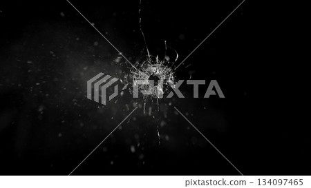 Freeze Motion Shot of Glass Shattered by a Bullet from a Pistol on Black Background Freeze Motion Shot of Glass Shattered by a Bullet from a Pistol on Black Background 134097465