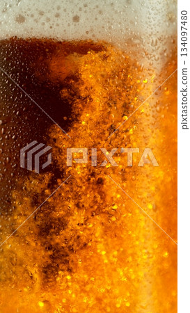 Macro Shot of Pouring Beer Drink , abstract background Macro Shot of Pouring Beer Drink , abstract background 134097480