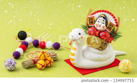 A cute rabbit and Japanese sweets New Year's decoration placed on a yellow background A cute rabbit and Japanese sweets New Year's decoration placed on a yellow background 134097753