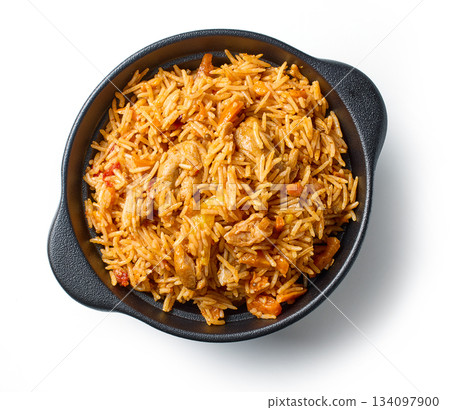 bowl of spicy rice with chicken meat and carrots 134097900