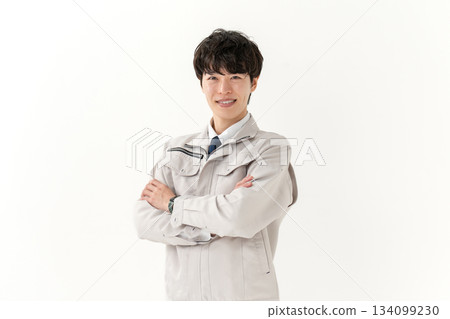 Portrait of a young man in work clothes 134099230