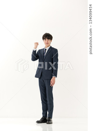 Business man, fist pump, whole body Business man, fist pump, whole body 134099454