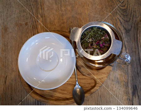 rustic tea ceremony at sunrise, serene breakfast setting featuring herbal tea and cozy rustic elements rustic tea ceremony at sunrise, serene breakfast setting featuring herbal tea and cozy rustic elements 134099646