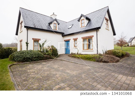 Paved footpath outside building 134101068