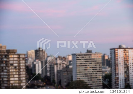 Blurry view of cityscape during summer Blurry view of cityscape during summer 134101234